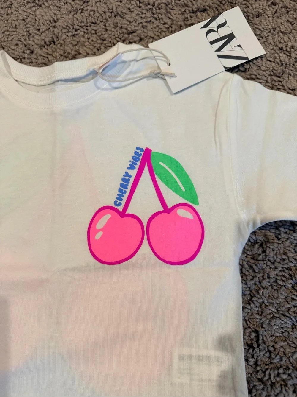 Zara White Tee with Neon Pink Cherry Graphic